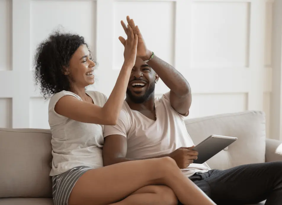 couple high fiving